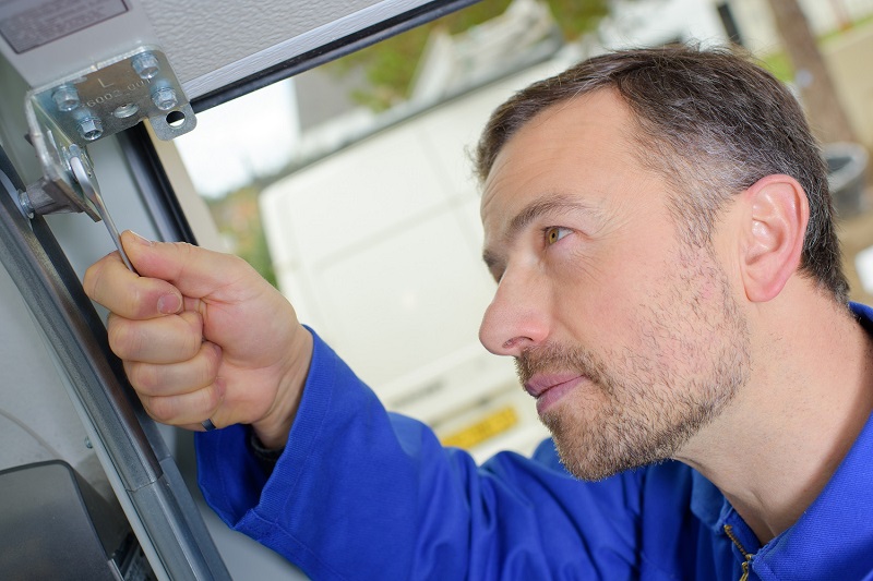Tips To Save Money On Garage Door Repairs